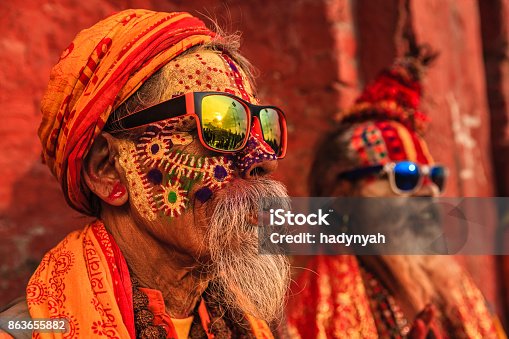 istock Sadhu - indian holymen sitting in the temple 863655882