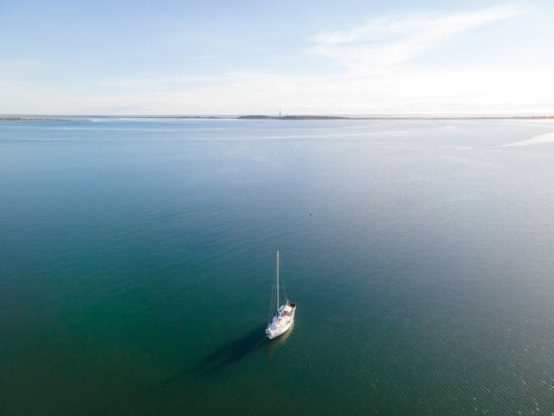 Sailboat anchored at Cape Lookout, North Carolina stock photo