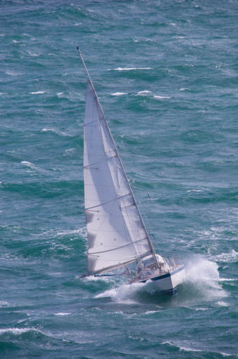 sailboat in big waves