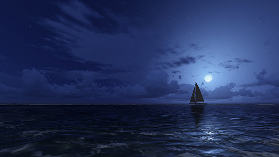 sailboat in the night ocean stock photo - download image