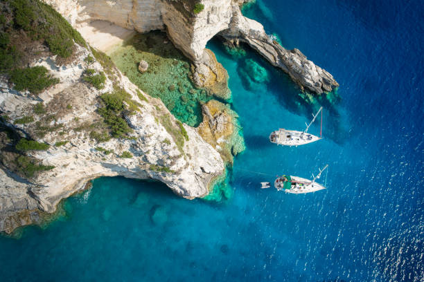 Sailboats in a beautiful bay, Paxos island, Greece stock photo