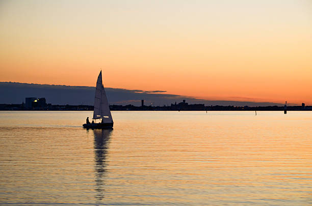sailing at evening - kalmar bildbanksfoton och bilder