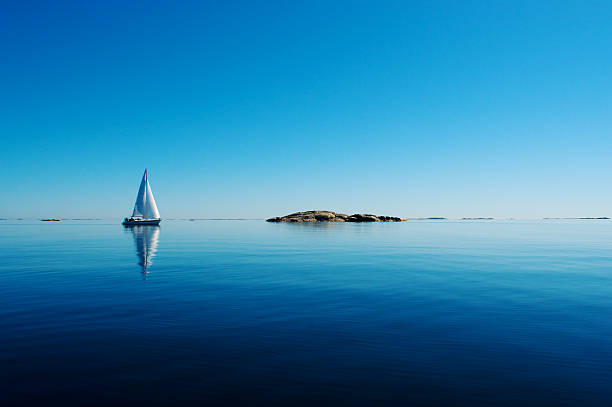 Sailing without wind Saling in the Stockholm archipelago, Sweden sweden stock pictures, royalty-free photos & images