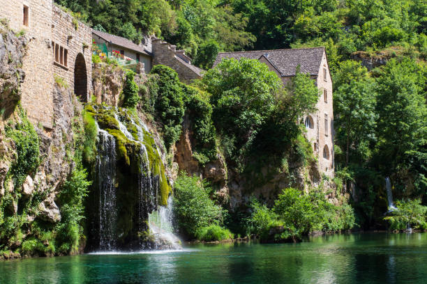Saint-Chély-du-Tarn village and cascade stock photo
