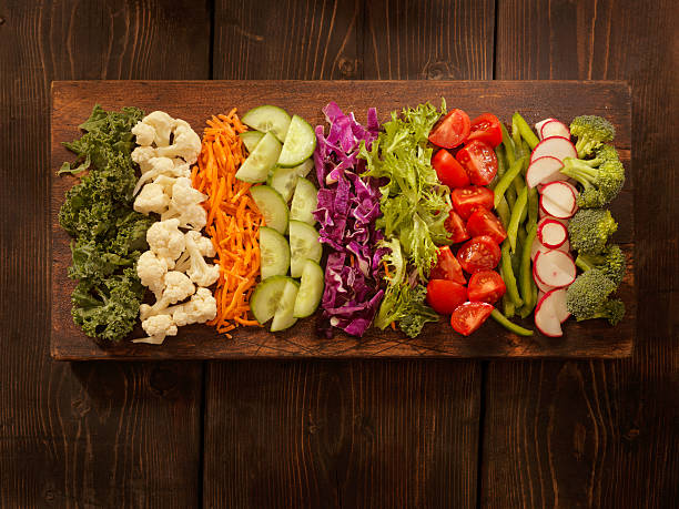 Salad Board Salad Board -Photographed on Hasselblad H3D2-39mb Camera chopped food stock pictures, royalty-free photos & images