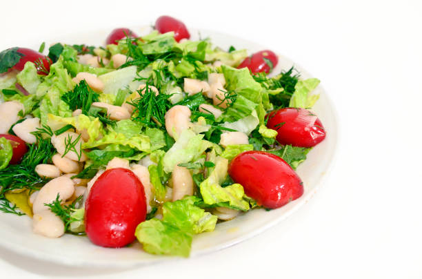 salad with beans and red tomatoes stock photo