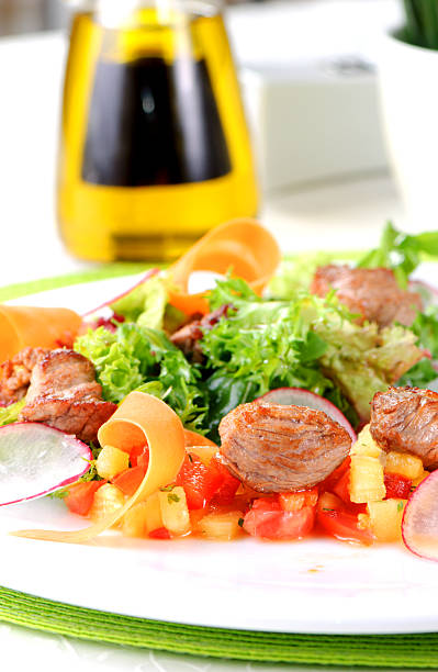 Salad with meat and vegetables stock photo