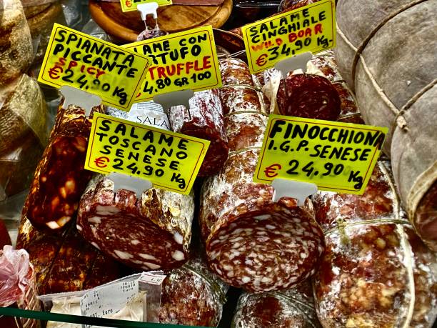 salamis for sale at the mercato centrale firenze. stock photo