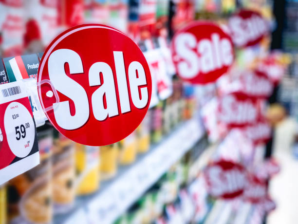 Sale signage Supermarket shelf Marketing Promotion Discount stock photo