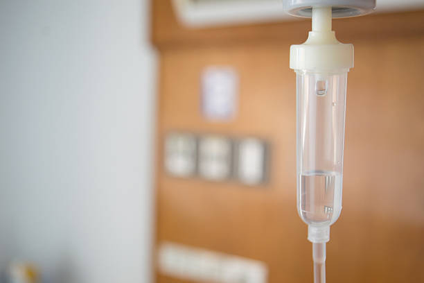 Saline solution Saline solution in hospital. infusion therapy stock pictures, royalty-free photos & images