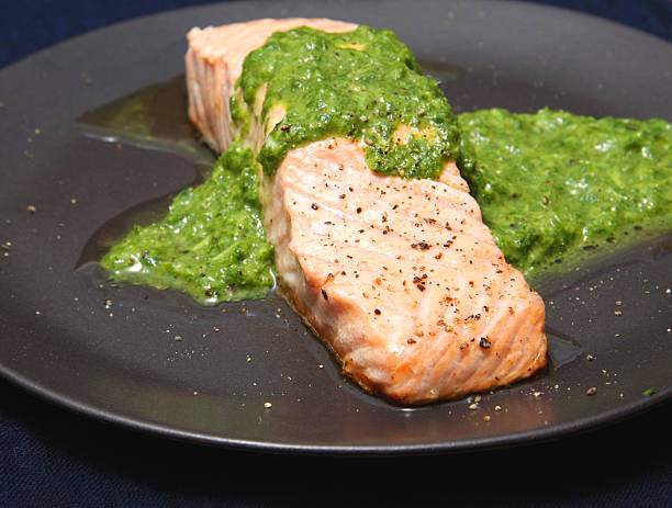 Salmon with salsa verde stock photo