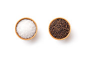 istock Salt and black pepper  in wooden bowl 1327598438