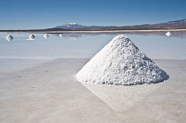 Salt piles in salt lake Uyuni, Bolivia stock photo
