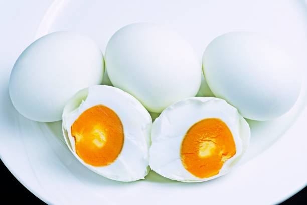 Salted eggs on plate.  egg stock pictures, royalty-free photos & images
