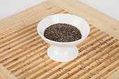 istock Salvia hispánica - chia seeds in white cup. 1217848838