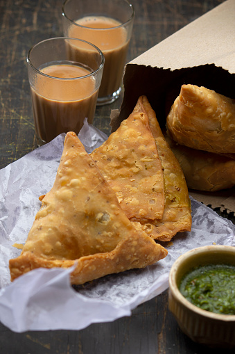 Samosa And Hot Tea Or Chai Snack Stock Photo - Download Image Now - iStock