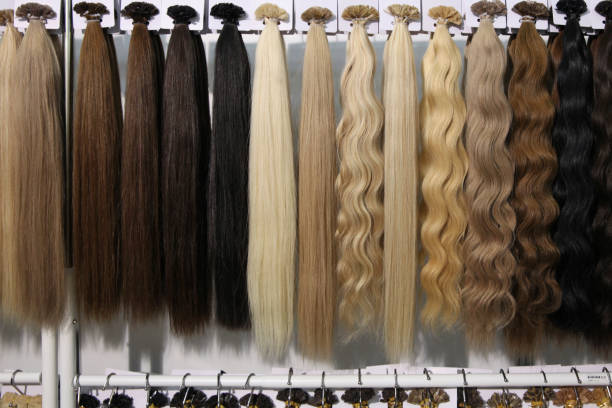 Samples of long hair, a large selection from blonde to brunette, straight and curly Samples of long hair, a large selection from blonde to brunette, straight and curly black hair extension stock pictures, royalty-free photos & images