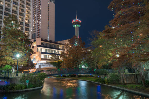 San Antonio River Walk and Downtown Buildings at Night with Christmas Lights Long Exposure stock photo
