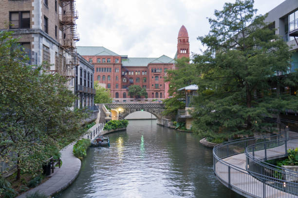 San Antonio River Walk with Court House in Background stock photo