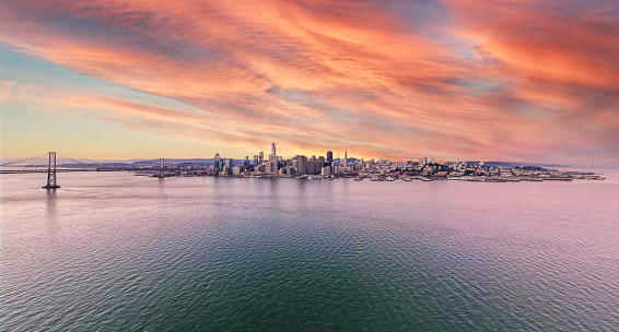 High quality stock photo of a spectacular sunset and the skyline of San Francisco .