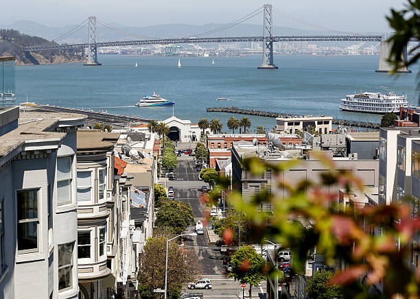 San Francisco street and Oakland Bay Bridge stock photo