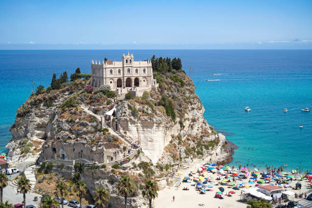 Sanctuary of Santa Maria dell Isola on top of the rock and Rotonda beach in Tropea, Italy stock photo