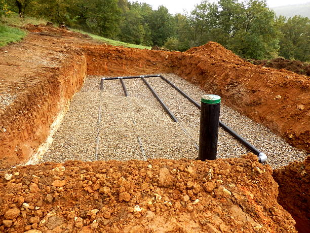 Sand and Gravel Drainage System Bottom layer of pipework laid on gravel in the construction of a sand and gravel drainage system poisonous stock pictures, royalty-free photos & images
