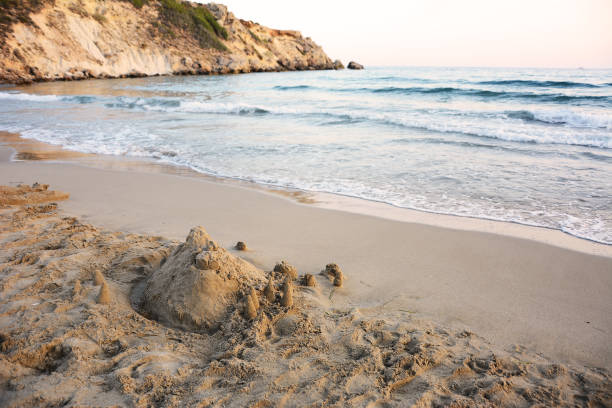 Sand castle on the seashore. stock photo