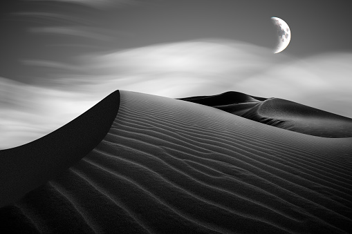Nam Cuong sand dune in night, with moon and cloud - Phan Rang, Ninh Thuan province, central Vietnam