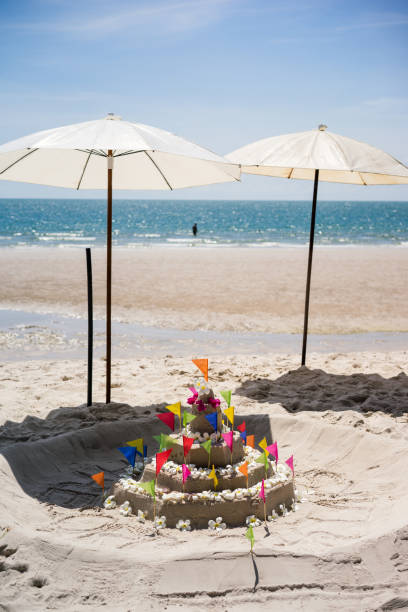 sand sculpture on beach stock photo