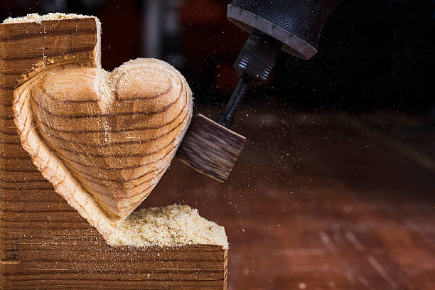 sanding wood heart close stock photo