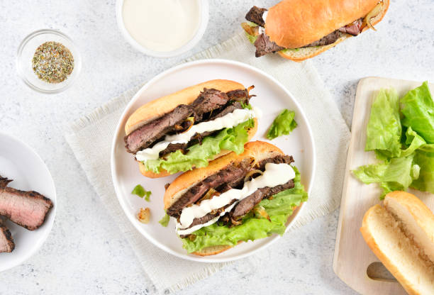 Sandwiches with beef and caramelized onion stock photo