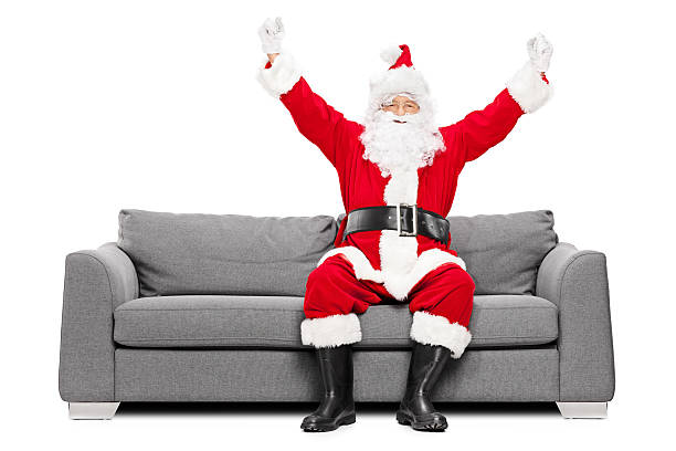 Best Santa Claus Sitting Down Stock Photos, Pictures & Royalty-Free