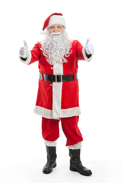 Santa Claus giving a thumbs up sign. stock photo