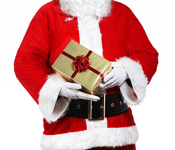 Santa Claus holding presents stock photo