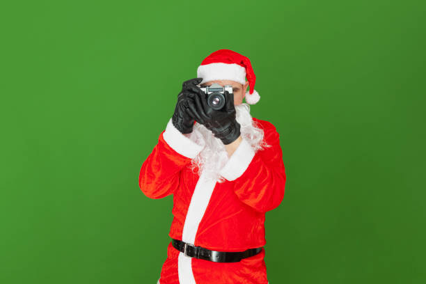 Santa Claus taking a picture in front stock photo