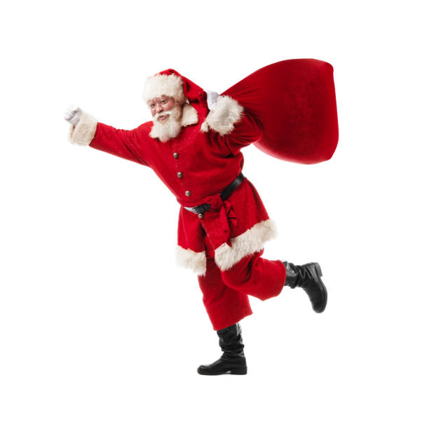 Santa Claus with bag with gifts stock photo