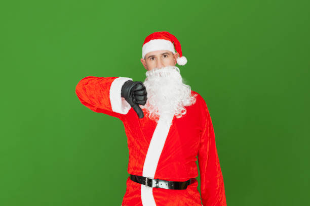 Santa Claus with his thumb down stock photo
