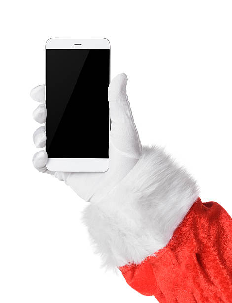 santa holding smartphone - smartphone christmas imagens e fotografias de stock