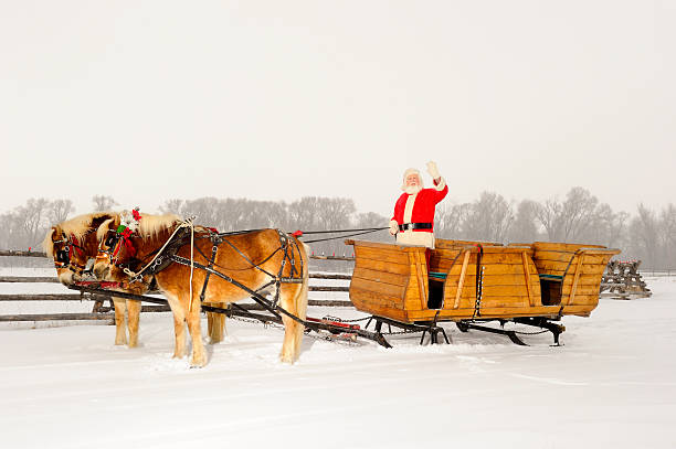 Santa In A Winter Wonderland With His Sleigh And Horses stock photo