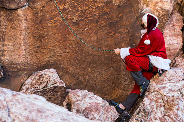 Santa Rock Climber stock photo