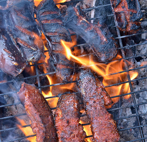 Sausage on a grill stock photo