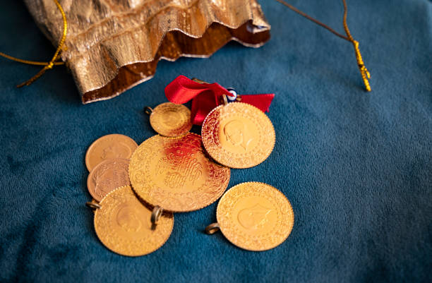 Saving Turkish Gold coins at home stock photo