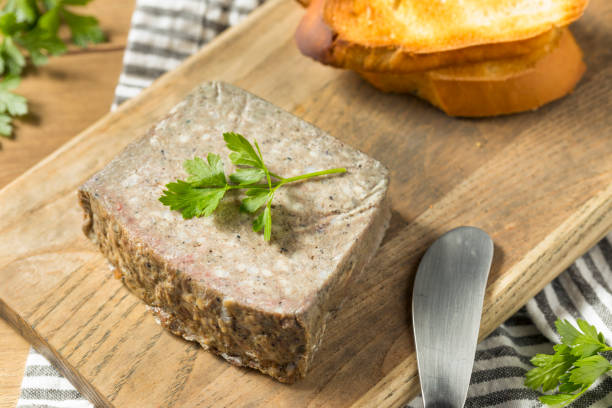 Savory Duck Liver Pate Spread Savory Duck Liver Pate Spread with Toast and Parsley liver pâté photos stock pictures, royalty-free photos & images
