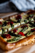 istock Savory tart with asparagus on puff pastry - shallow DOF 1404487110