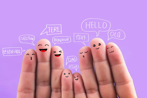 Say hello in different languages, fingers stock photo