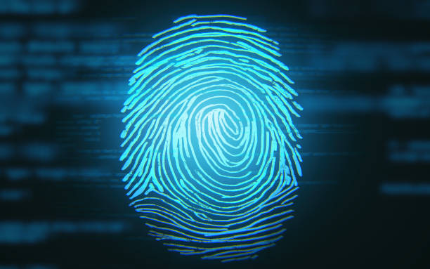 Shot of fingerprint technology and binary code against a dark...