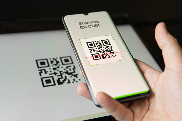Scanning QR code with mobile smart phone. all graphics on the screen are made up. checking the qr code on the mobile phone. stock photo