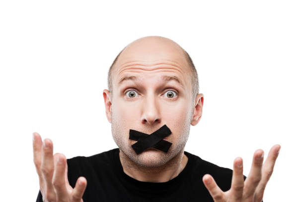 Scared adult man adhesive tape closed mouth stock photo
