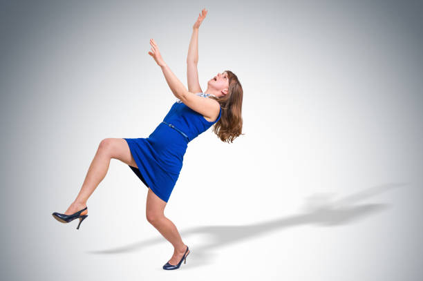 Royalty Free Woman Stumbling Pictures, Images and Stock 